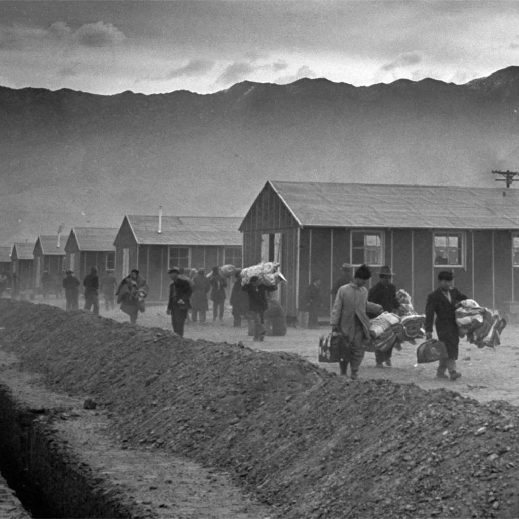 The first group of Japanese-Americans arrive at the Manzanar Camp, 1942
