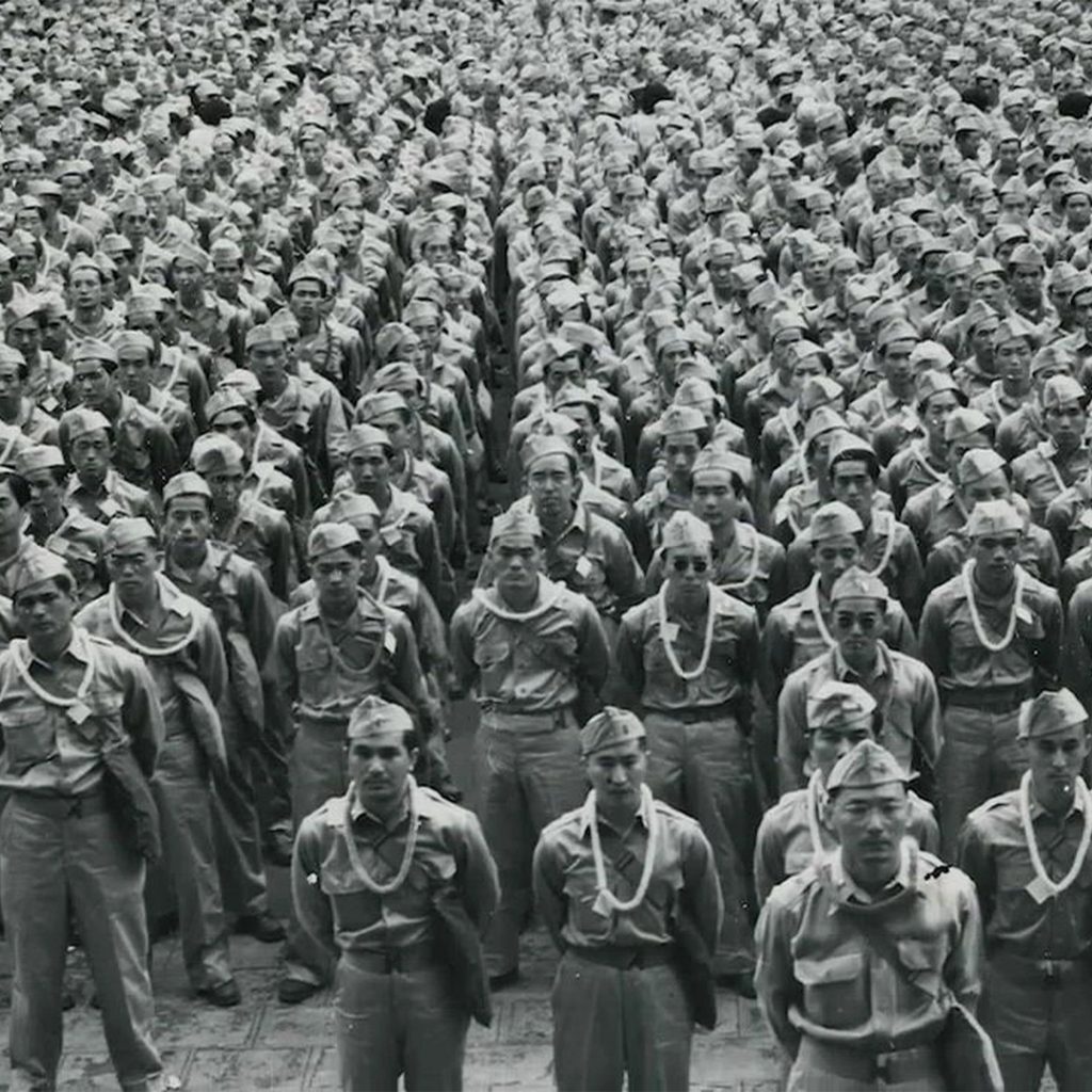 Thousands gather to bid 442nd RCT farewell as they left for Camp Shelby, Honolulu, 1943, credit Honolulu Star Bulletin