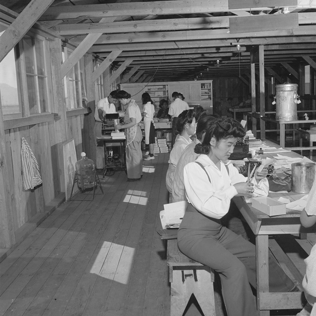 Staff of the Manzanar Free Press at work, July 2, 1942, photo by Dorothea Lange