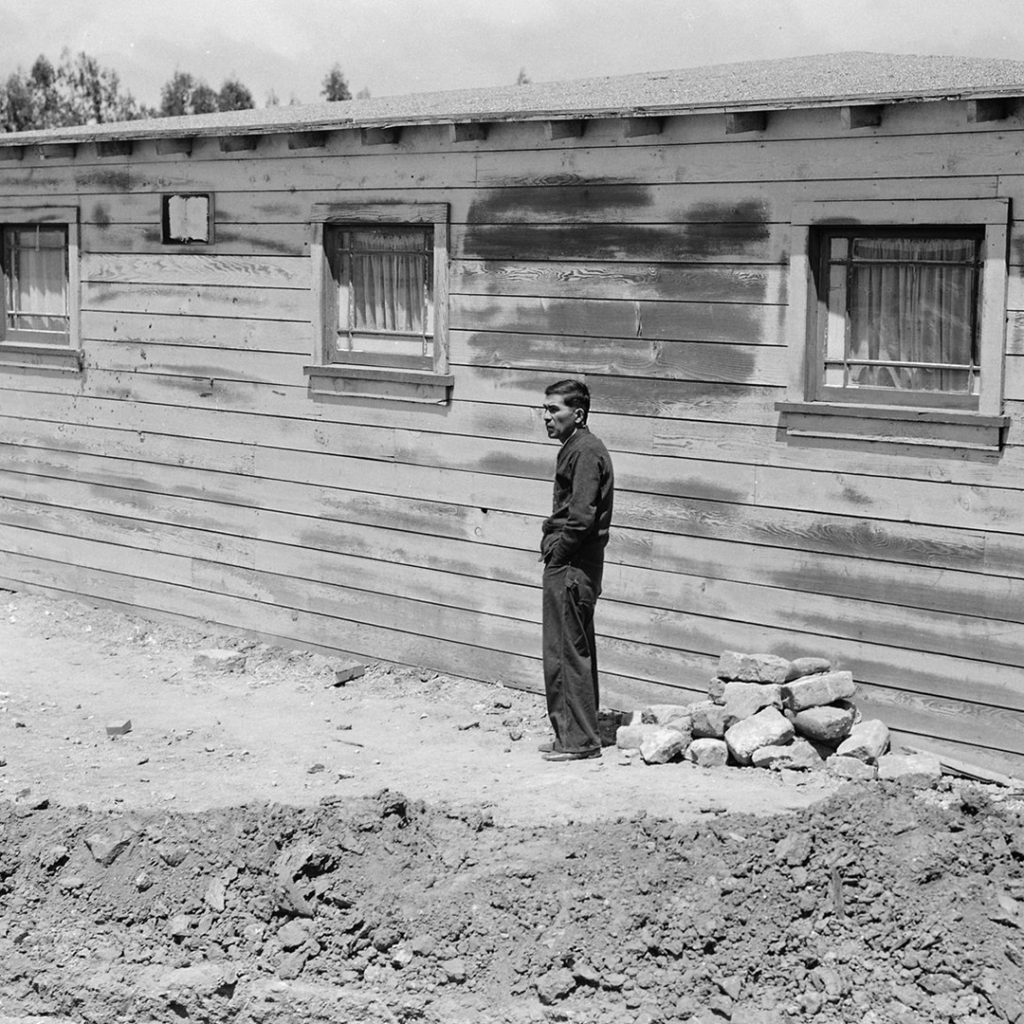 A man milling around, Tanforan Assembly Center, June 16, 1924, photo by Dorothea Lange