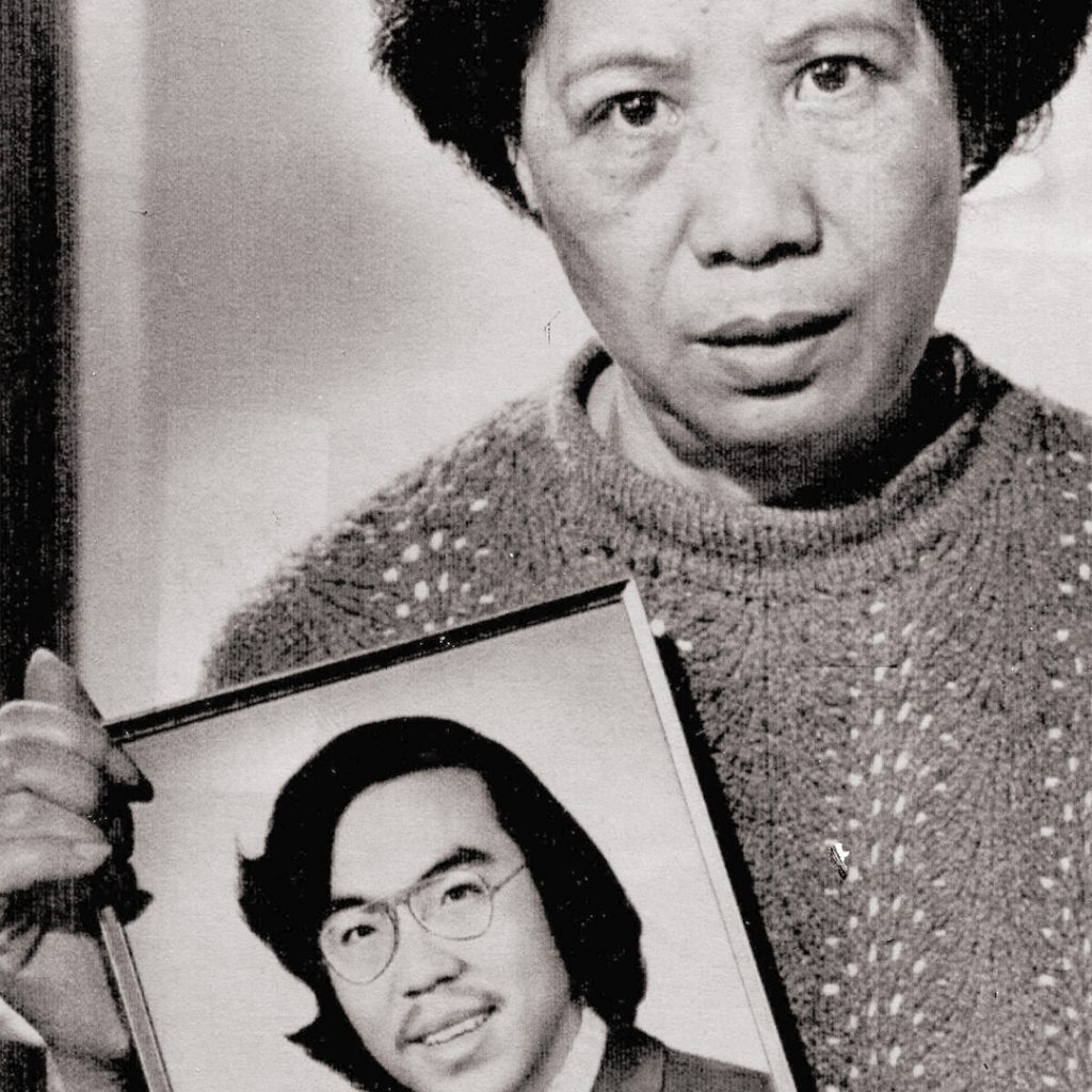 Lily Chin holding a portrait of her son Vincent Chin, credit Richard Sheinwald, Associated Press