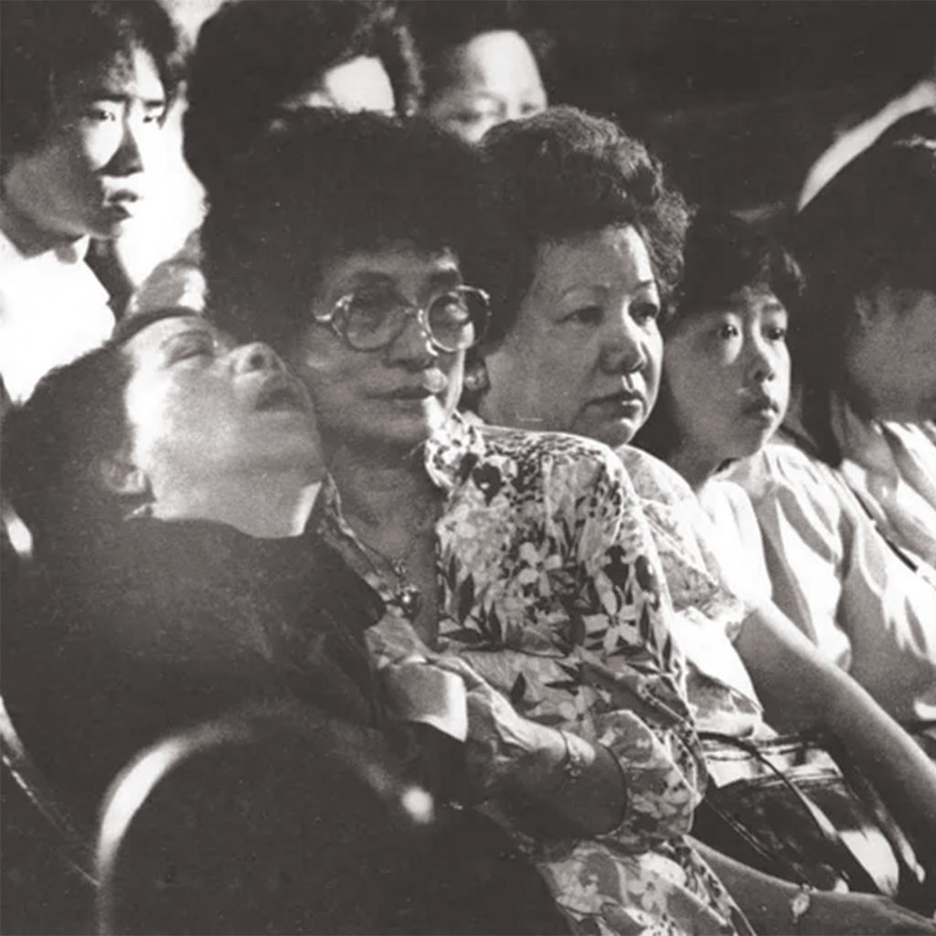 Vincent’s mother Lily Chin, comforted at the memorial service for her son at Central United Methodist Church, June 19, 1983, credit Detroit Free Press