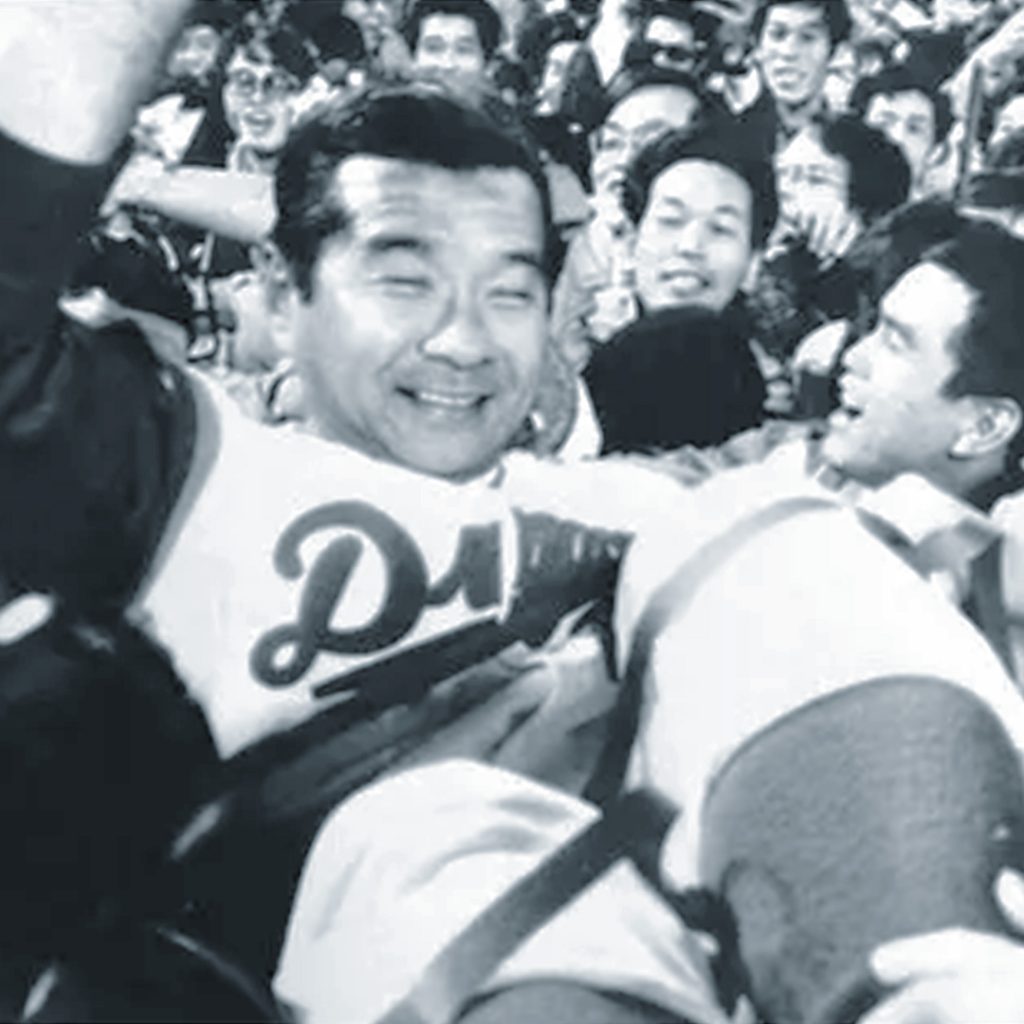 Wally Yonamine, then the manager of the Chunichi Dragons, being tossed in the air by players and fans after winning the Central League Championship, Chunichi Stadium, Nagoya, credit Kyodo