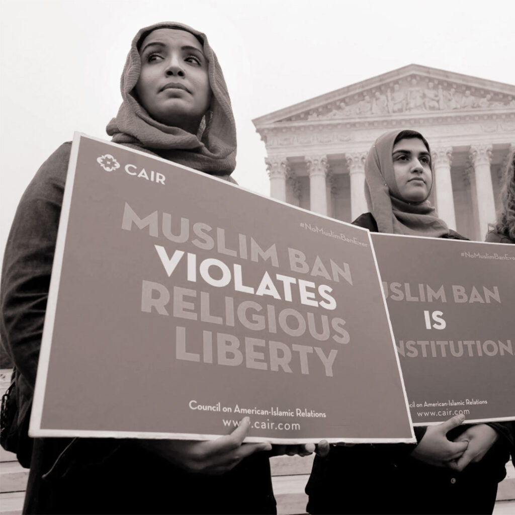 Protesters gathered outside the Supreme Court while the justices were considering the legality of President Trump’s travel ban, credit Yuri Gripas, Reuters