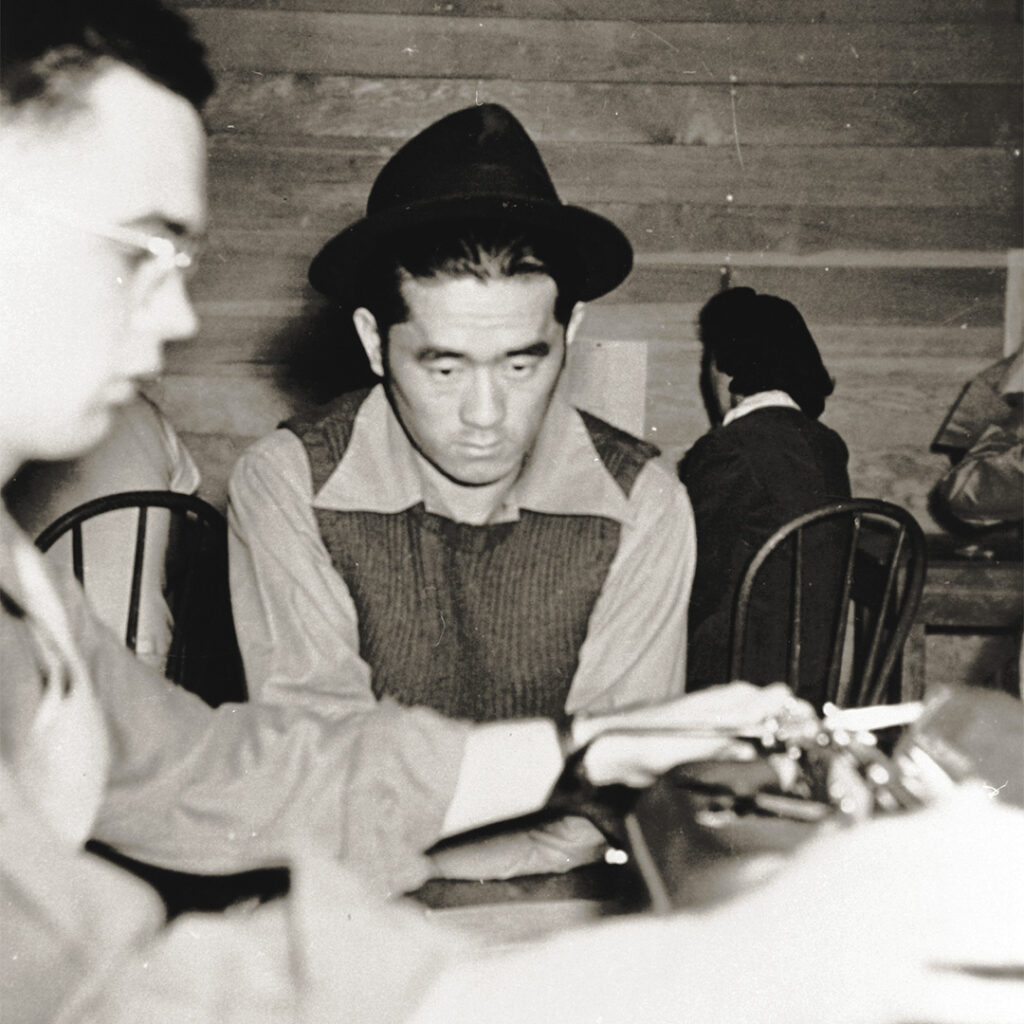A “segregant” being processed at Tule Lake, September 1943. Young men like him were transferred here—and later tried in federal court—for answering “no” and “no” to two loyalty questions.