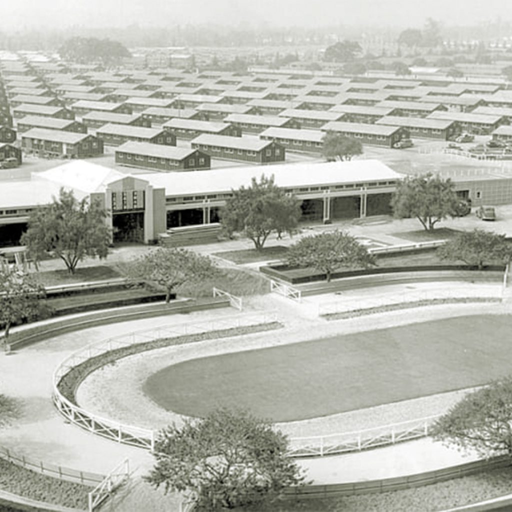 Santa Anita Assembly Center with 1940's barracks behind grandstand, Arcadia, California
