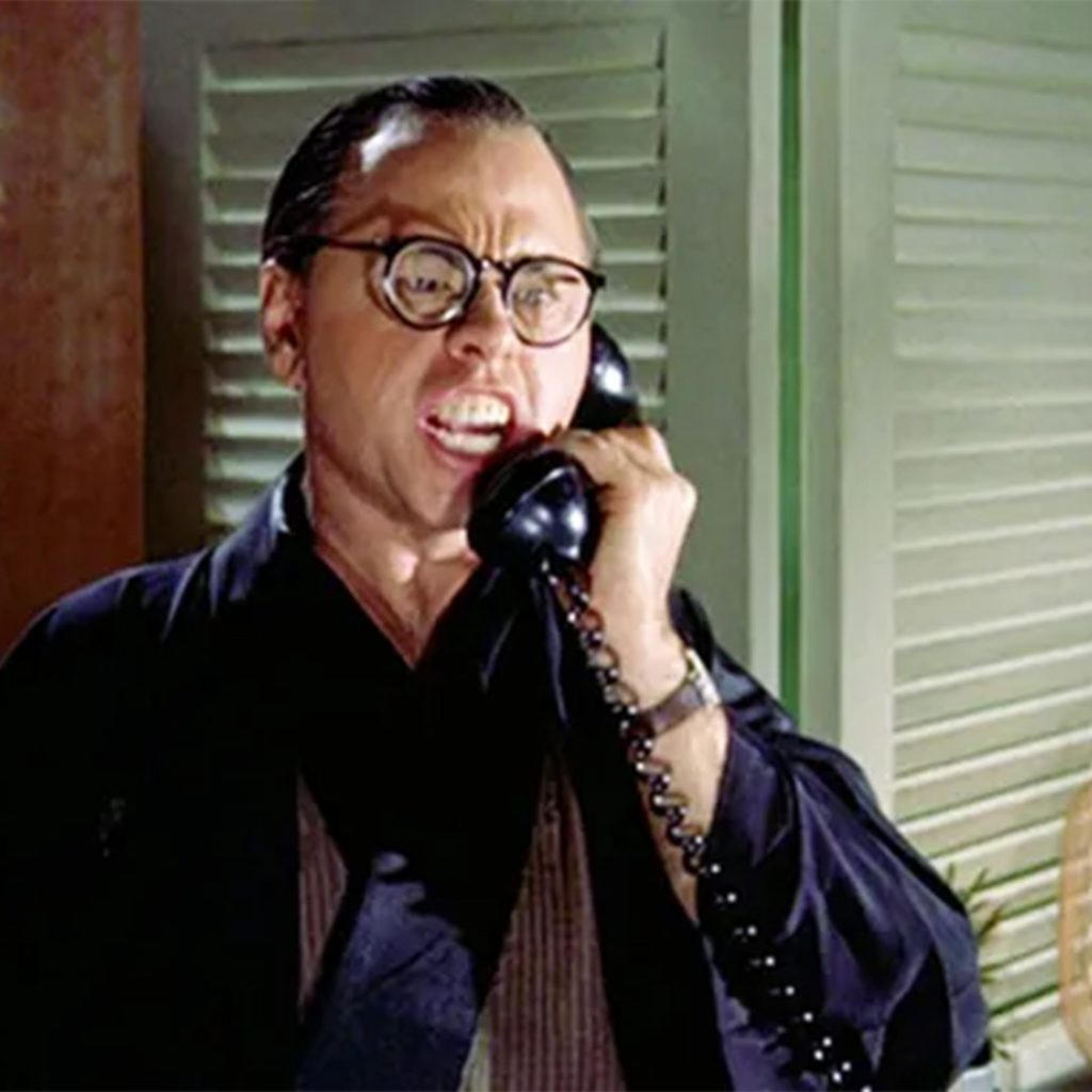 A white actor in yellowface, fake accent, and buck teeth – the unfortunate standard at the time. Mickey Rooney as “Mr. Yunioshi” in Breakfast at Tiffany’s, 1961
