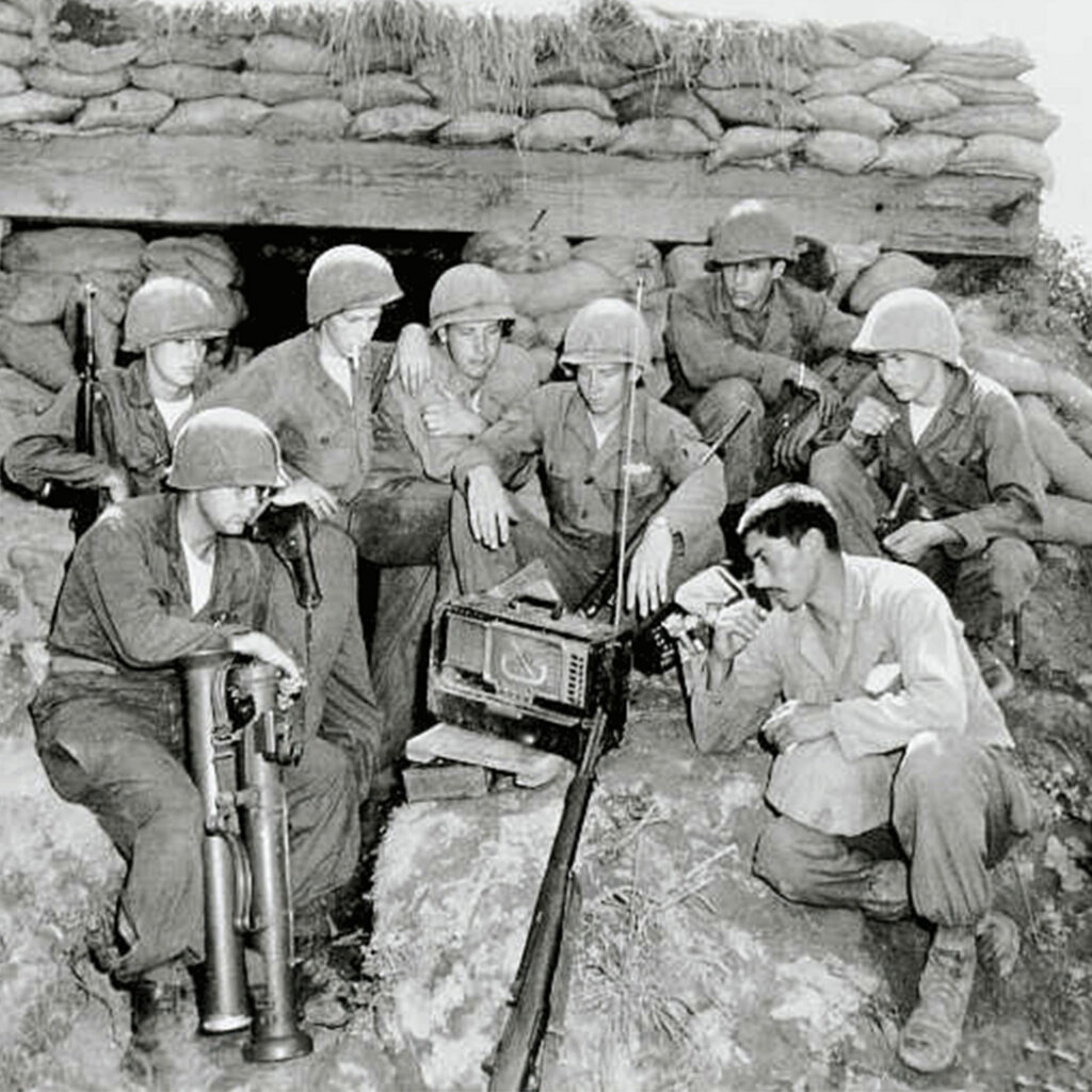 Soldiers in the Pacific listening to The Zero Hour — Many American servicemen looked forward to regularly gathering around radios to catch the show