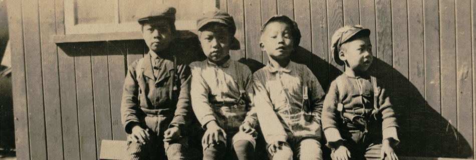 Four boys at Portmouth Square, San Francisco, 1906