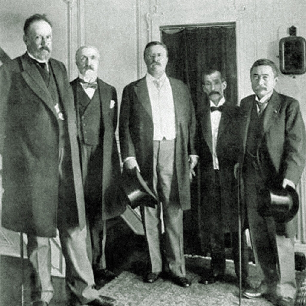 Theodore Roosevelt with peace envoys from Russia and Japan at the signing of the Treaty of Portsmouth, 1905