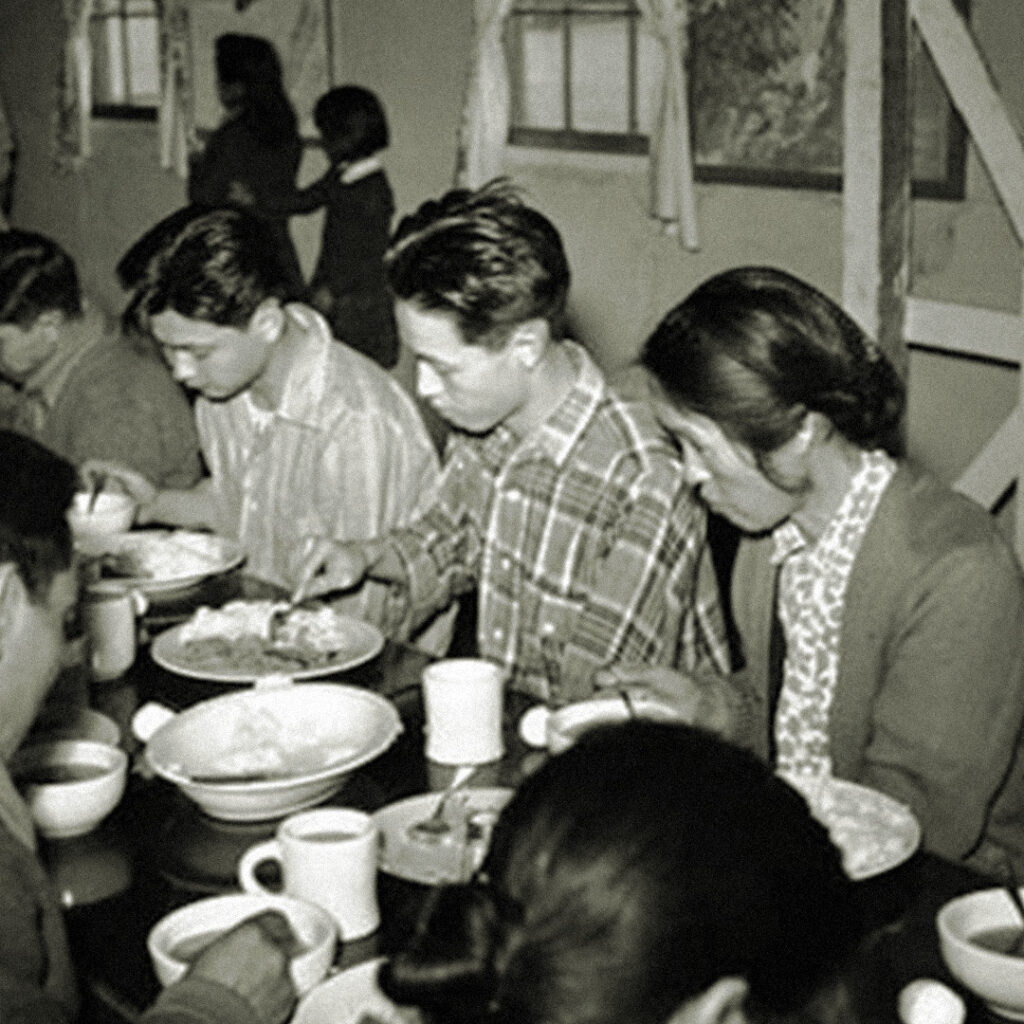 Stanley Hayami and his brother Walt in the mess hall at Heart Mountain.