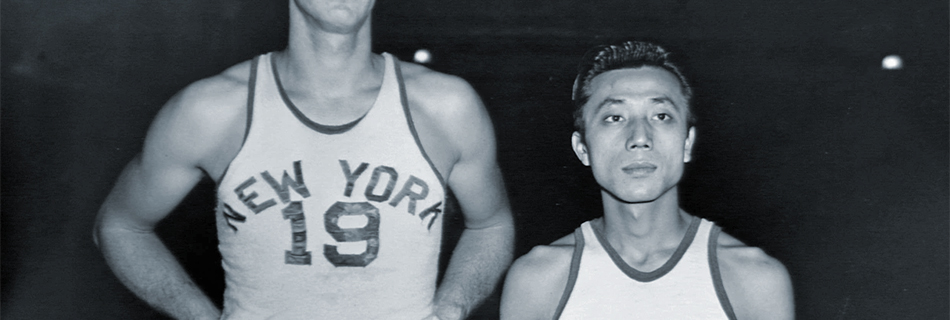 New York Knickerbockers' Wat Misaka standing next to Lee Knorek