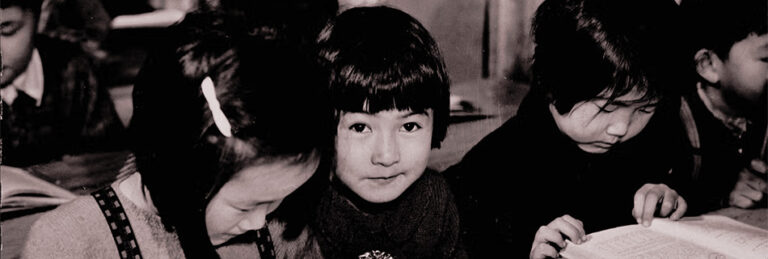Loyalty to the British Empire is taught to these second and third generation Japanese children in an Internment Camp in British Columbia c1942. (CP PHOTO/Jack Long National Archives of Canada C-067492)