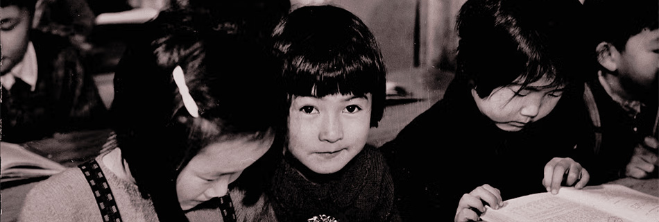 Loyalty to the British Empire is taught to these second and third generation Japanese children in an Internment Camp in British Columbia c1942. (CP PHOTO/Jack Long National Archives of Canada C-067492)