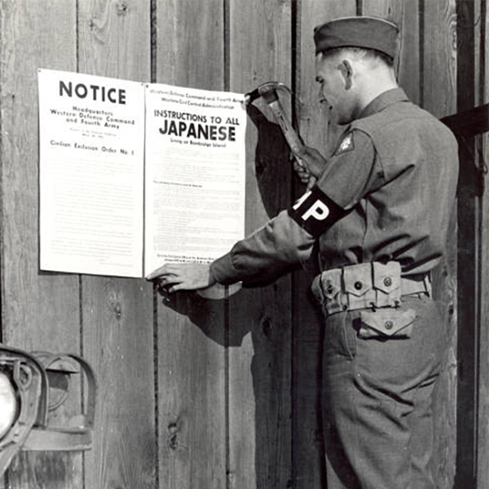 Civilian Exclusion Order No.1 being posted at Bainbridge Island in 1942