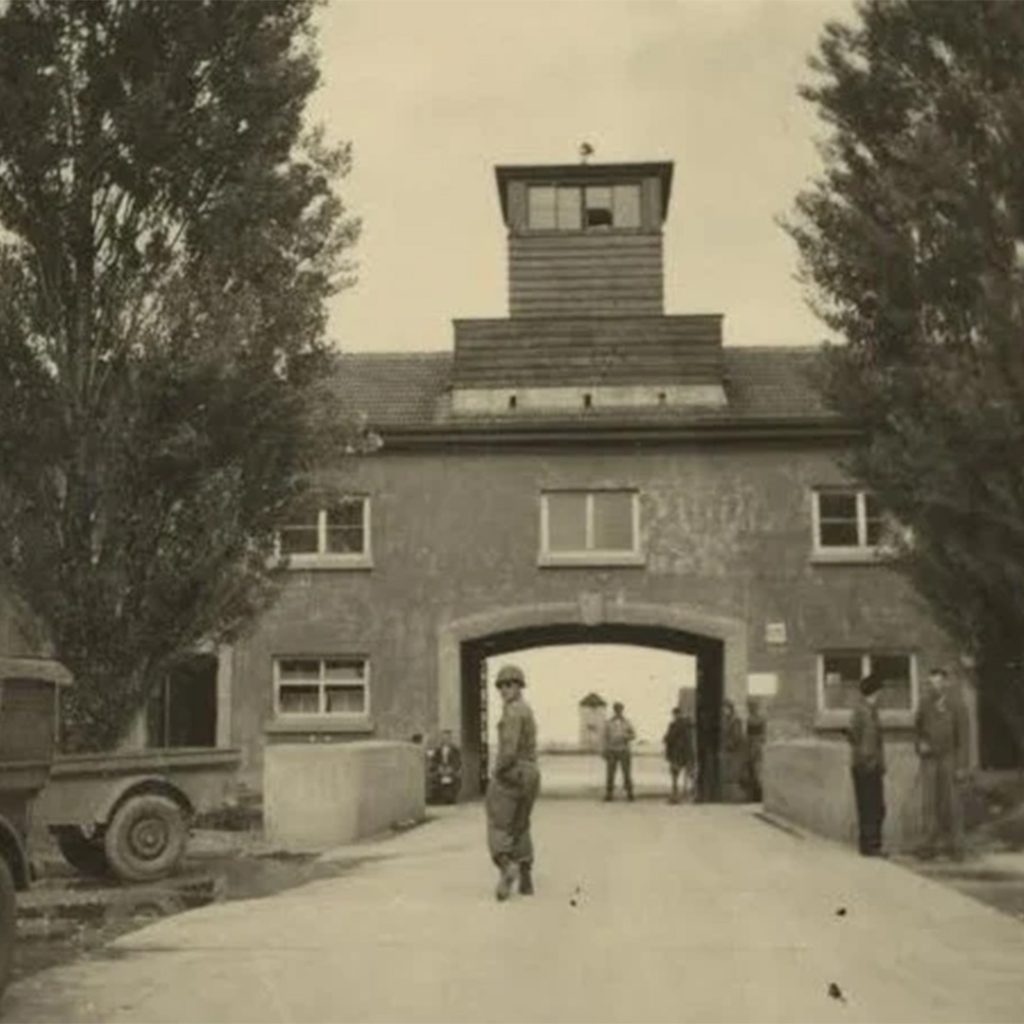 A photo taken by Sus Ito, on the back is written, "Dachau Prison Camp," credit Japanese American National Museum