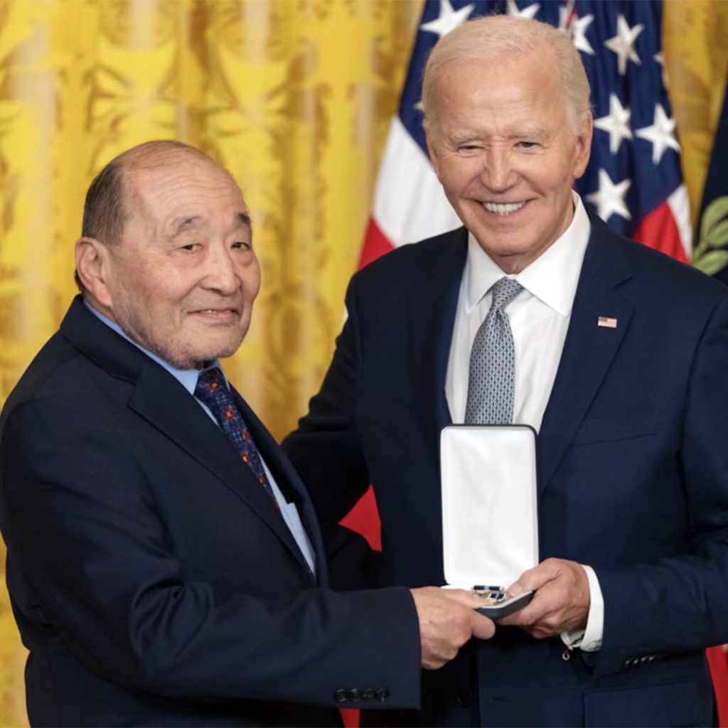 President Joe Biden awarding Presidential Citizens Medal to Wayne Tsutsumi on behalf of Mitsuye Endo