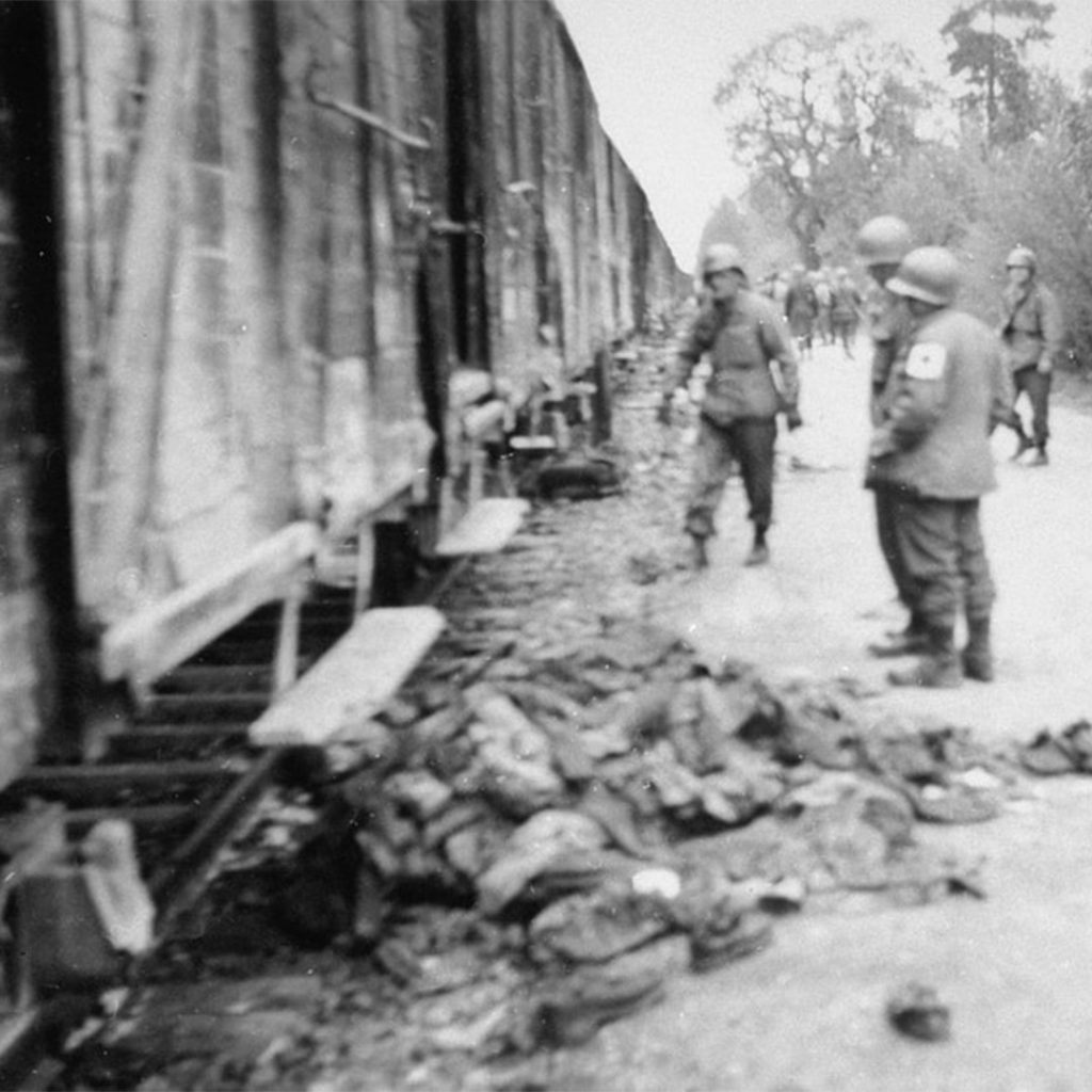 Dozens of dead bodies were discovered by American troops on a train, Dachau, Germany, April 1945, credit API