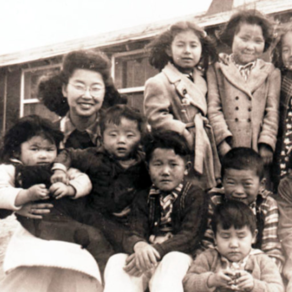 Yuri Kochiyama with her Sunday School kids in Camp Jerome, gift of Yuri Kochiyama, credit Japanese American National Museum