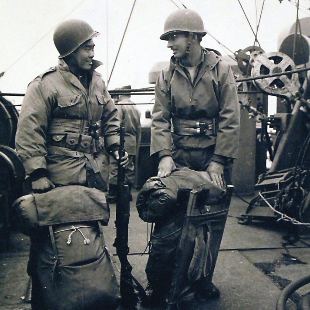 Sergeant Moriwaki and Staff Sergeant Spaulding of the MIS on deck of USS Heywood, Battle of Attu, May 1943, credit National Archives