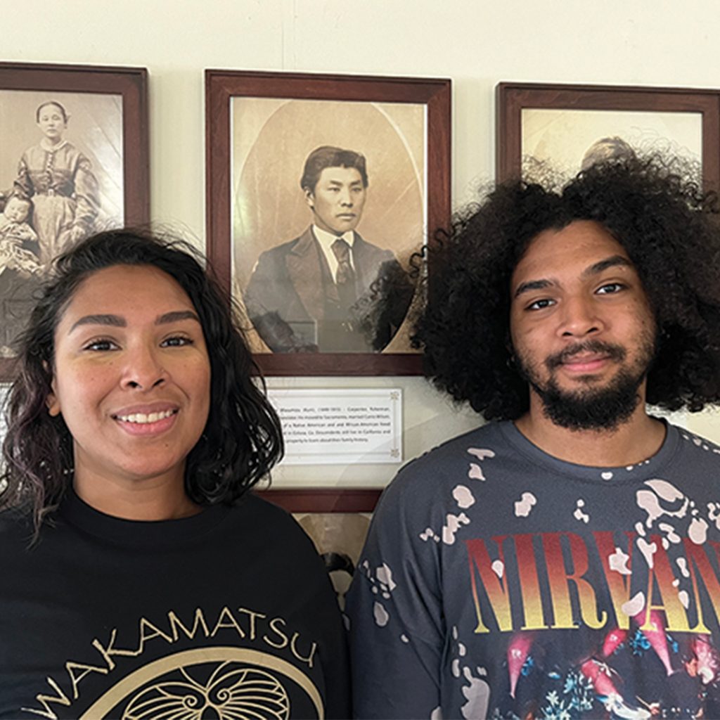 Andrea Lashley and her son Jayson in front of the picture of Kuninosuke Masumizu at Wakamatsu Farm, credit Kota Morikawa/Nichibei News