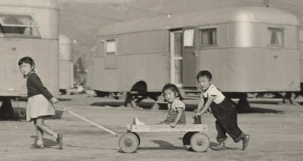 Three children residing in the Winona Housing Project, Burbank, CA, November 1945, credit WRA, The Bancroft Library, UC Berkeley