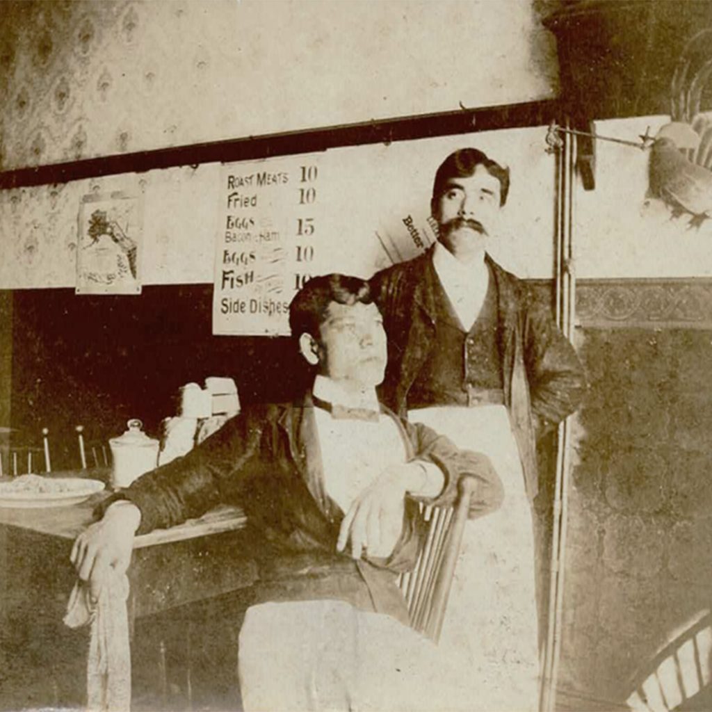 Japanese waiters at Sakichi Yanagisawa’s restaurant in California. While many from the Wakamatsu Colony returned to Japan or scattered into the West, others like Yanagisawa stayed and built new lives.