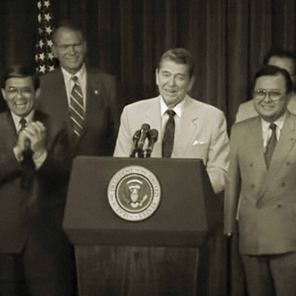 President Reagan with Norman Mineta and Daniel Inouye at Civil Liberties Act of 1988