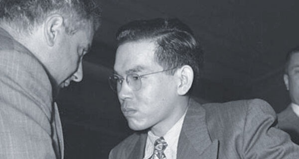Tomoya Kawakita with his lawyer during his trial