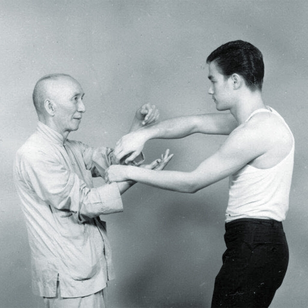 Bruce Lee training with Master Yip Man