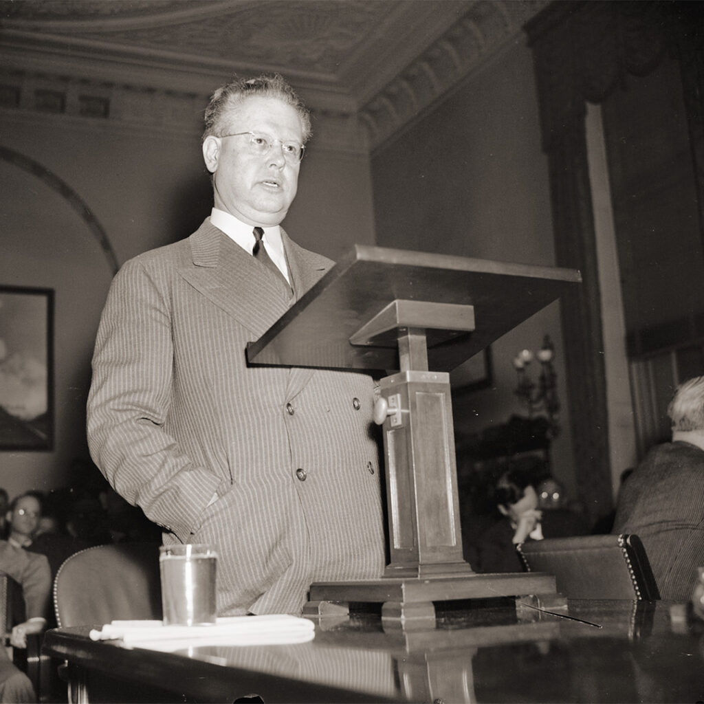 Ralph Lawrence Carr speaking at a podium