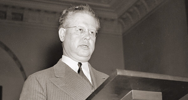 Ralph Lawrence Carr speaking at a podium
