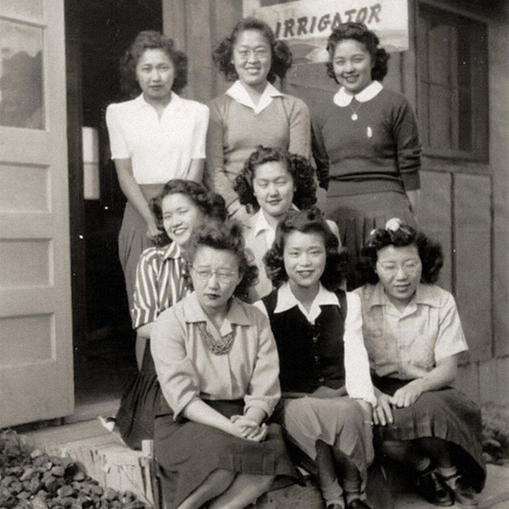 Cherry Kinoshita, (seated front center) with the camp newspaper staff at Minidoka in 1943.