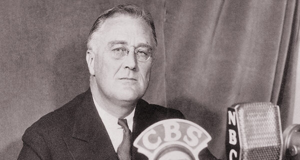 President Franklin D. Roosevelt delivering a radio broadcast from Washington known as his “fireside chats.”