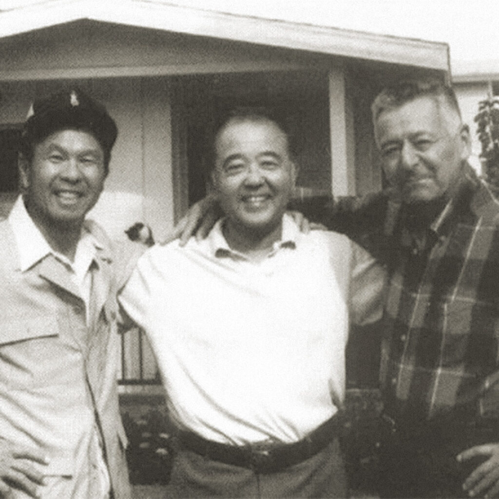 Ralph Lazo (right) with Japanese American friends.