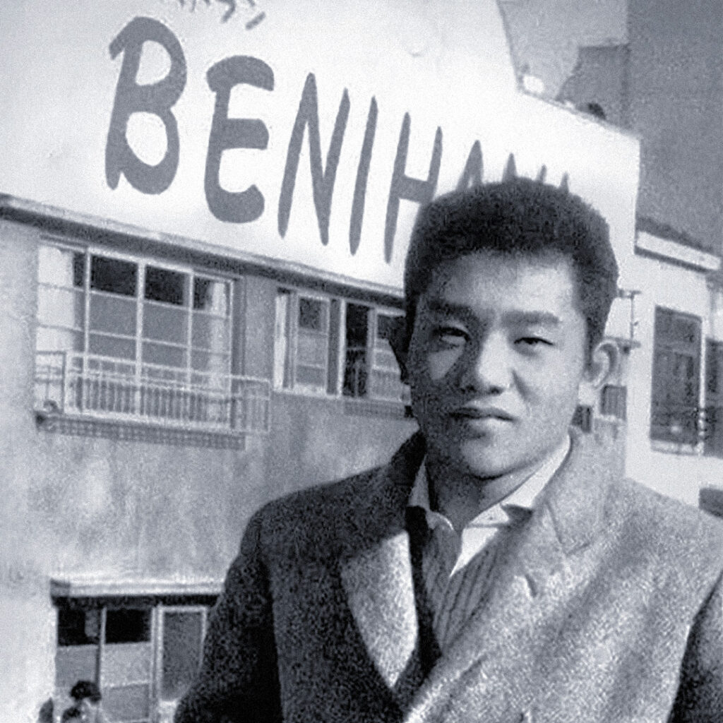 Rocky Aoki in front of the first Benihana Restaurant in New York