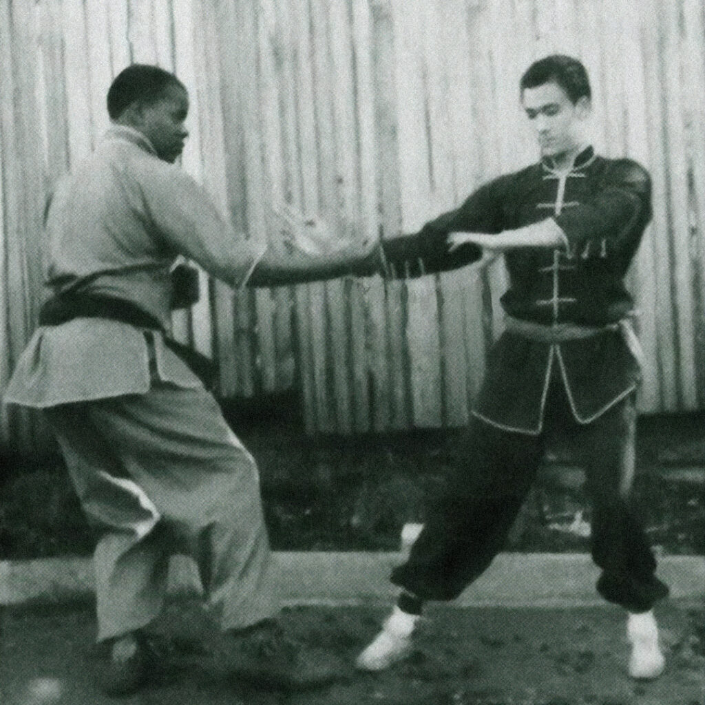 Bruce Lee with his first student, Jesse Glover.