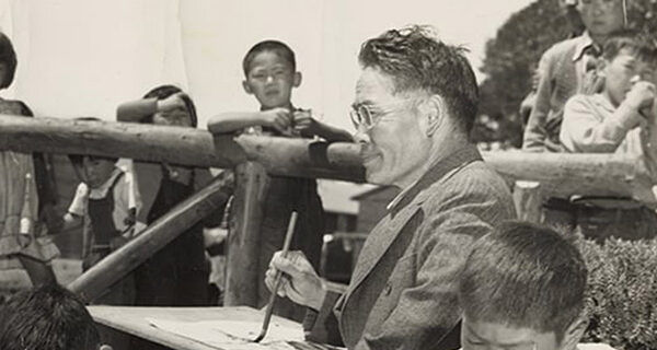 Chiura Obata teaching a childrens art class at Tanforan Art School, 1942
