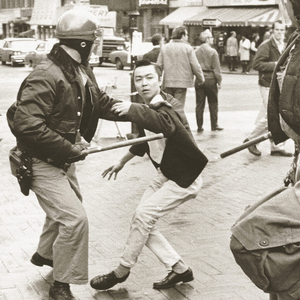 Richard Aoki being arrested in front of UC Berkeley, February 18, 1969.