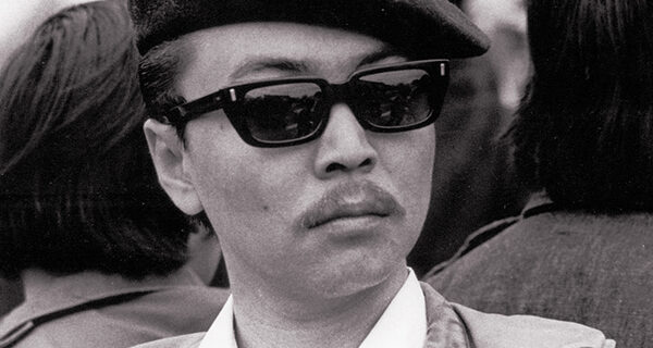 Richard Aoki with beret and sunglasses