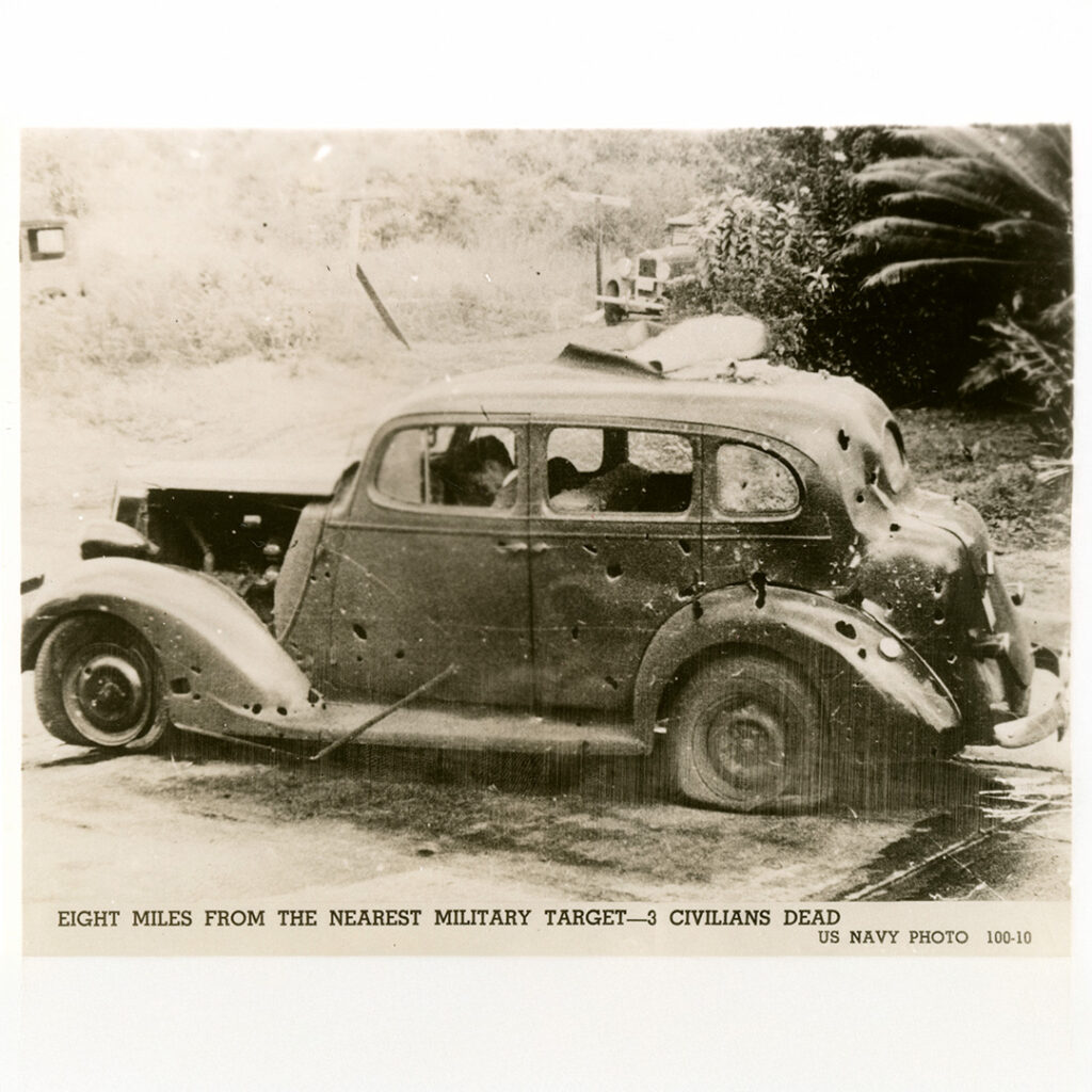A dead civilian inside a car, 8 miles away from Pearl Harbor. December 7, 1941. AP Photo / U.S. Navy