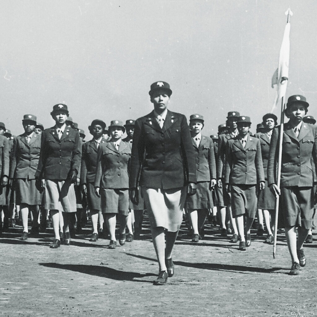 WAAC Capt. Charity Adams of Columbia, NC leading a troop at WAAC Training Center, Fort Des Moines, Iowa, May 1943