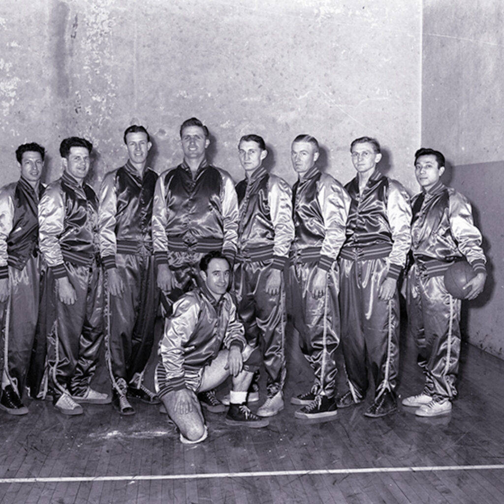Wat Misaka (far right) with the Weber College basketball team