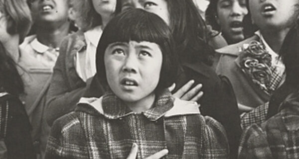 Children of the Weill public school in a flag pledge ceremony, photo by Dorothea Lange, April 1942