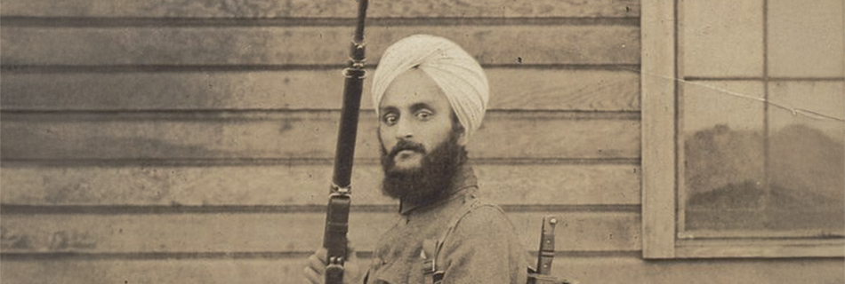 Bhagat Singh Thind with a rifle. Courtesy of SAADA