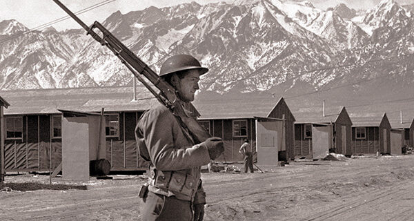 Soldier guarding Manzanar, May 23, 1943. AP Photo