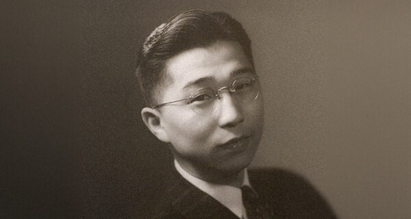 young Gordon Hirabayashi in a suit