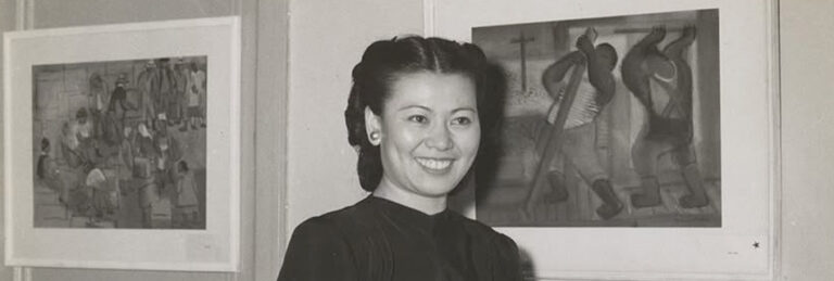 Mine Okubo standing by her art, courtesy of UC Berkeley, Bancroft Library