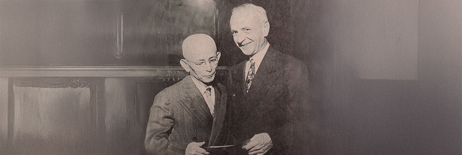 the first evacuation claims check presented to Tokuji Tokimasa by Claims Agent William H. Jacobs, photo by Jack Iwata. Courtesy of the Japanese American National Museum
