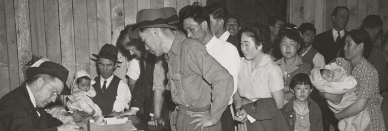 Attendants register arrivals at Santa Anita Park Assembly Center, April 5, 1942, Photo by Clem Albers, The Bancroft Library UC Berkeley